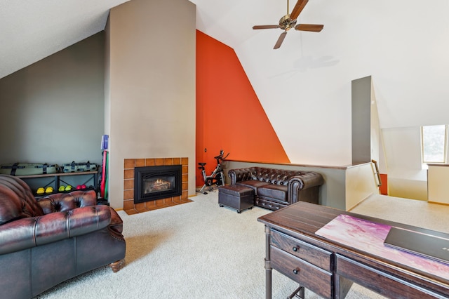 living room featuring high vaulted ceiling, carpet, a ceiling fan, and a tiled fireplace