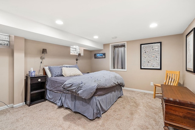 bedroom with recessed lighting, baseboards, and light carpet