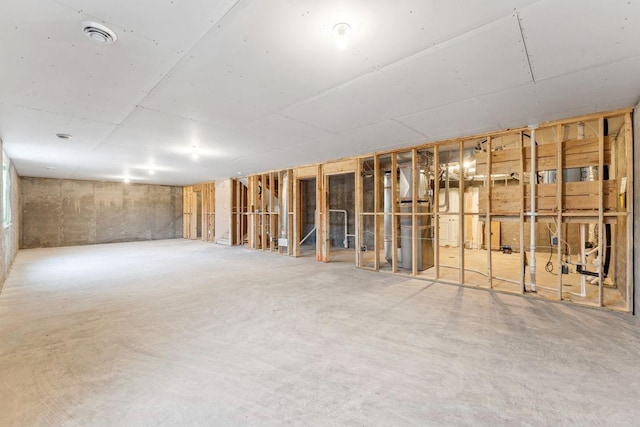 unfinished basement featuring visible vents