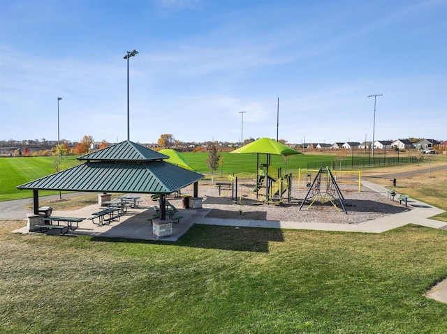community jungle gym featuring a gazebo and a yard