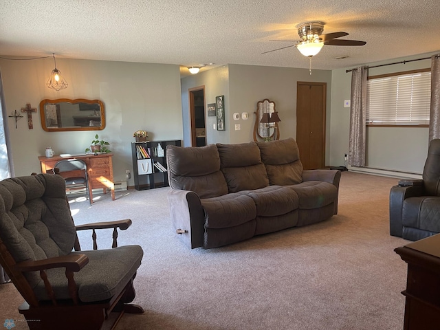 living room featuring carpet floors, baseboard heating, a ceiling fan, and a textured ceiling