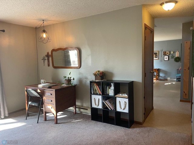 carpeted office space with a textured ceiling, a baseboard heating unit, and baseboards