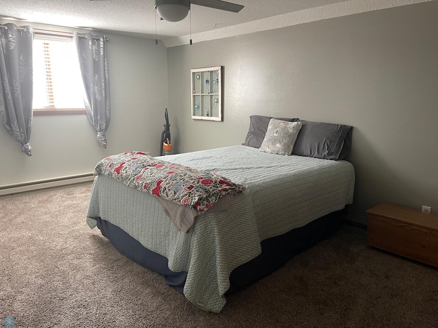 carpeted bedroom featuring a textured ceiling, baseboard heating, and ceiling fan