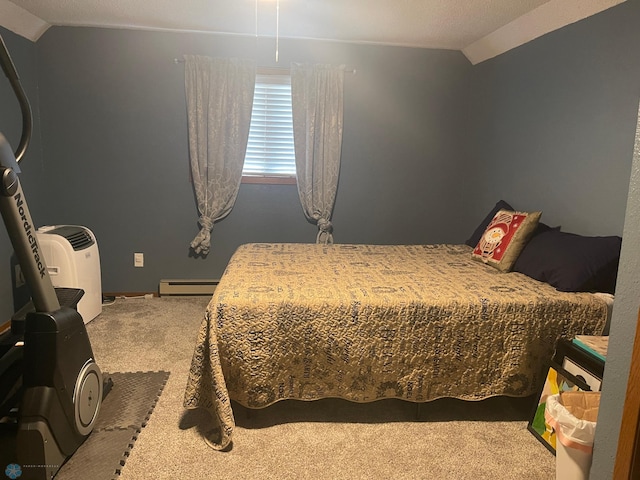 bedroom featuring baseboard heating, carpet, and vaulted ceiling