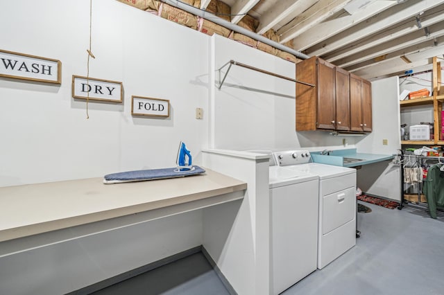 N2699 County Road A, Salem Twp, WI 54750 - washroom with cabinet space and washing machine and clothes dryer