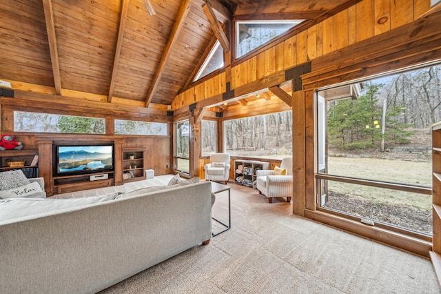 N2699 County Road A, Salem Twp, WI 54750 - living room with wood walls, carpet flooring, a wooden ceiling with exposed beams, and high vaulted ceiling