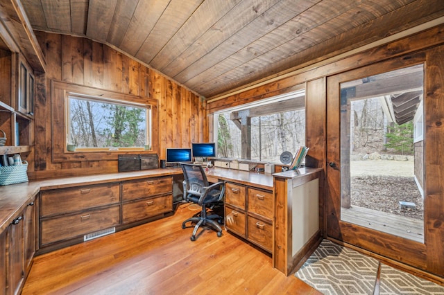 N2699 County Road A, Salem Twp, WI 54750 - office featuring lofted ceiling, wooden ceiling, light wood-style flooring, wood walls, and built in study area