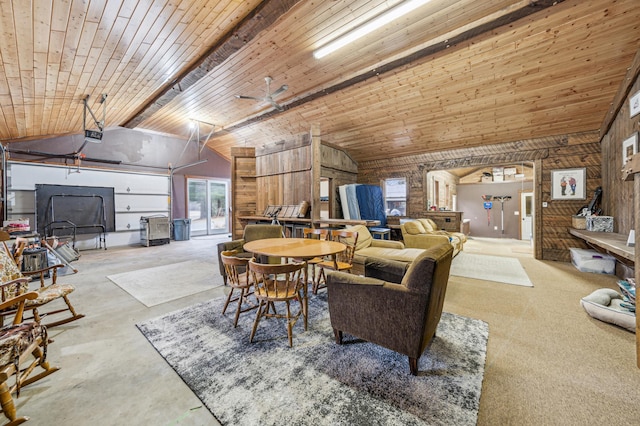 N2699 County Road A, Salem Twp, WI 54750 - dining room featuring wooden walls, concrete flooring, vaulted ceiling, and wooden ceiling