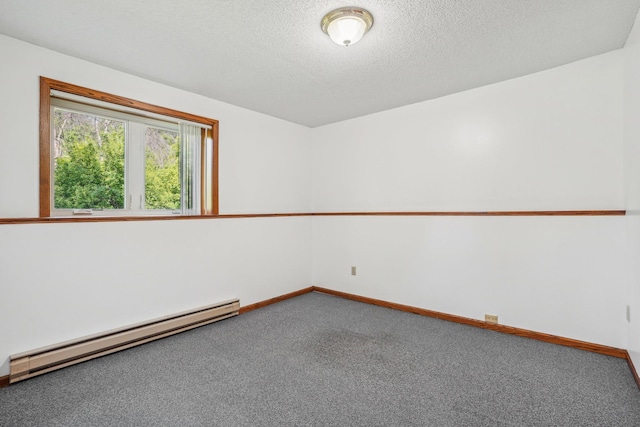 2605 Forest St, Maplewood, MN 55109 - spare room with a baseboard radiator, carpet, baseboards, and a textured ceiling