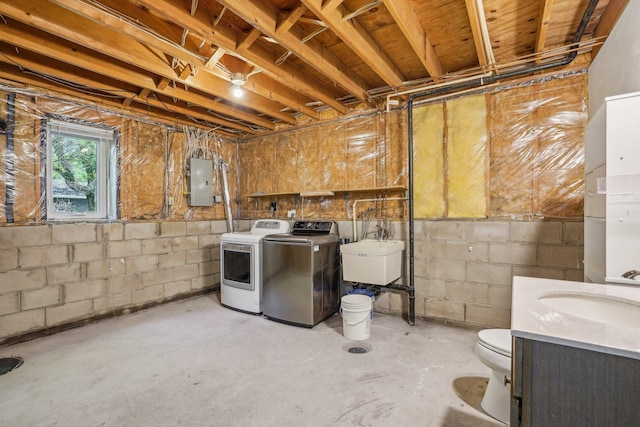 2605 Forest St, Maplewood, MN 55109 - basement with independent washer and dryer, a sink, and electric panel