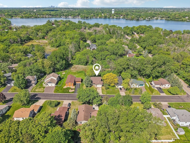 2605 Forest St, Maplewood, MN 55109 - aerial view of property's location featuring a large body of water, nearby suburban area, and a forest