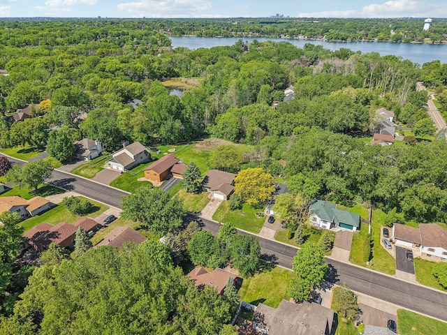 2605 Forest St, Maplewood, MN 55109 - aerial view of property's location with a heavily wooded area, a nearby body of water, and nearby suburban area