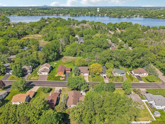2605 Forest St, Maplewood, MN 55109 - aerial view of property's location featuring a large body of water, nearby suburban area, and a heavily wooded area