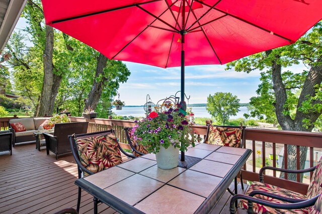 W3527 2nd St, Maiden Rock, WI 54750 - wooden terrace with a water view, outdoor dining area, and an outdoor living space