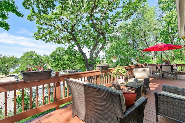W3527 2nd St, Maiden Rock, WI 54750 - wooden deck featuring outdoor dining space and outdoor lounge area