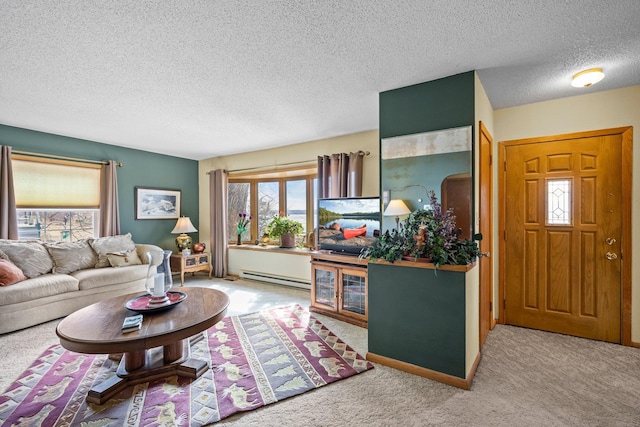W3527 2nd St, Maiden Rock, WI 54750 - living area with baseboard heating, carpet floors, and a textured ceiling