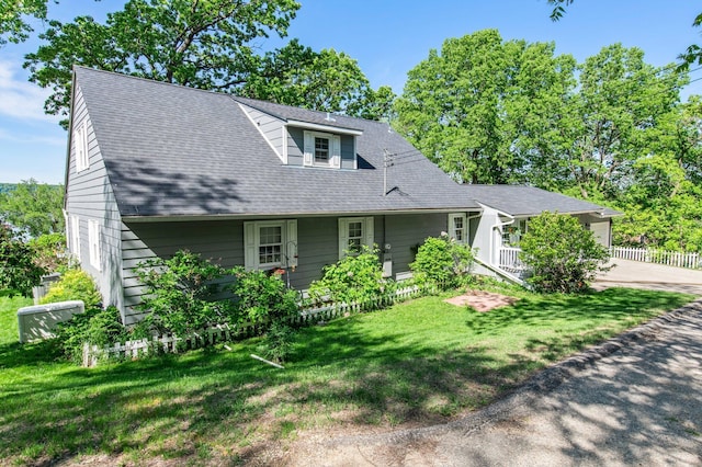 W3527 2nd St, Maiden Rock, WI 54750 - view of front of home with an attached garage and concrete driveway
