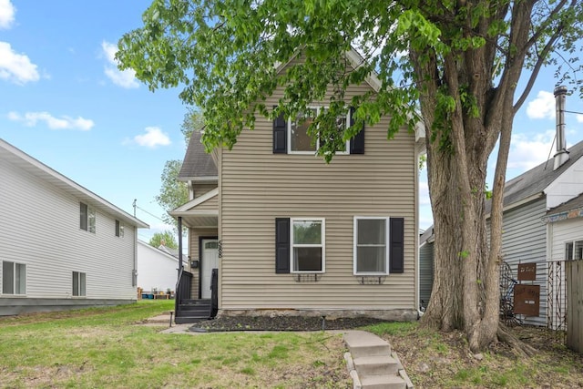 588 Van Buren Ave, Saint Paul, MN 55103 - rear view of property with a yard