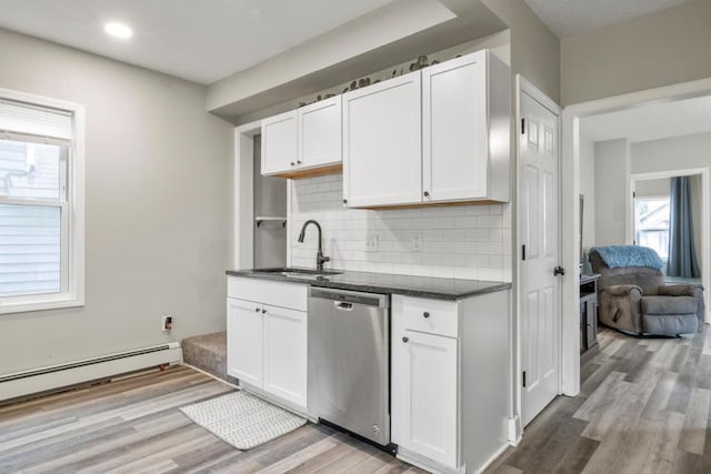 588 Van Buren Ave, Saint Paul, MN 55103 - kitchen featuring dishwasher, healthy amount of natural light, a sink, and light wood-type flooring