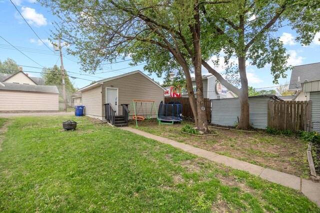 588 Van Buren Ave, Saint Paul, MN 55103 - view of yard with a fire pit and an outdoor structure