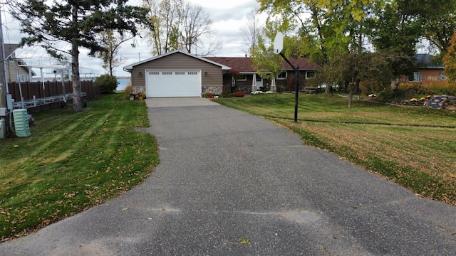 18063 Bernard Trl, Brainerd, MN 56401 - single story home with driveway, a garage, and stone siding
