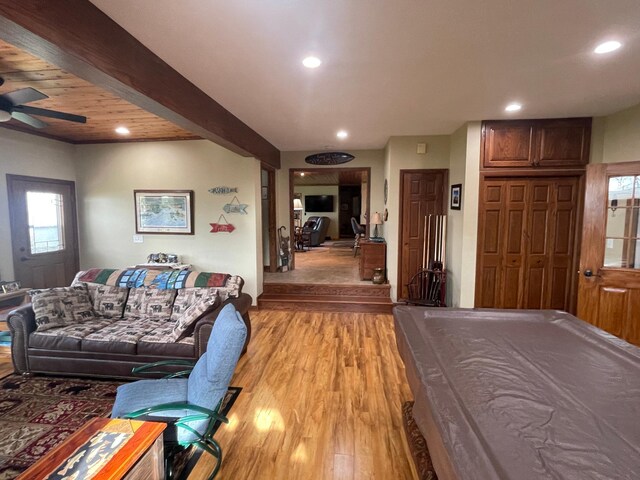 18063 Bernard Trl, Brainerd, MN 56401 - living area featuring light wood-style flooring, ceiling fan, recessed lighting, beam ceiling, and billiards