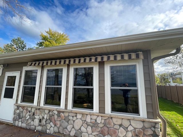 18063 Bernard Trl, Brainerd, MN 56401 - view of property exterior featuring stone siding