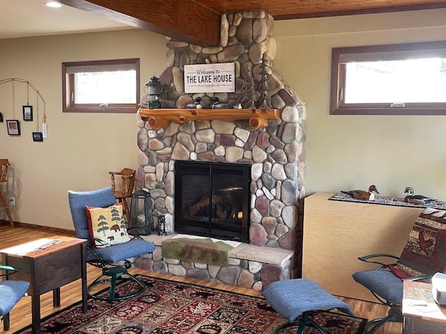 18063 Bernard Trl, Brainerd, MN 56401 - living area featuring wood finished floors, a fireplace, and recessed lighting