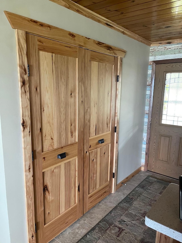 18063 Bernard Trl, Brainerd, MN 56401 - foyer entrance with wood ceiling and baseboards