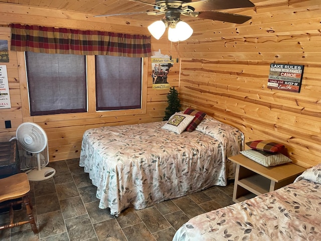 18063 Bernard Trl, Brainerd, MN 56401 - bedroom featuring wooden walls and ceiling fan