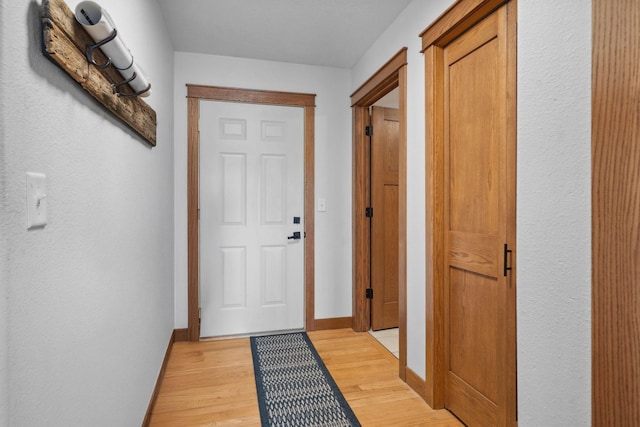 572 172nd St, Pleasant Valley Twp, WI 54015 - doorway to outside with light wood-type flooring and baseboards