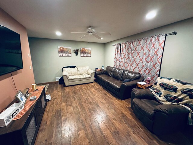 living area featuring wood-type flooring, recessed lighting, visible vents, and ceiling fan