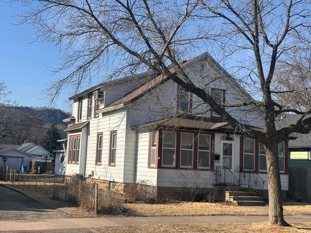 view of front of house with fence