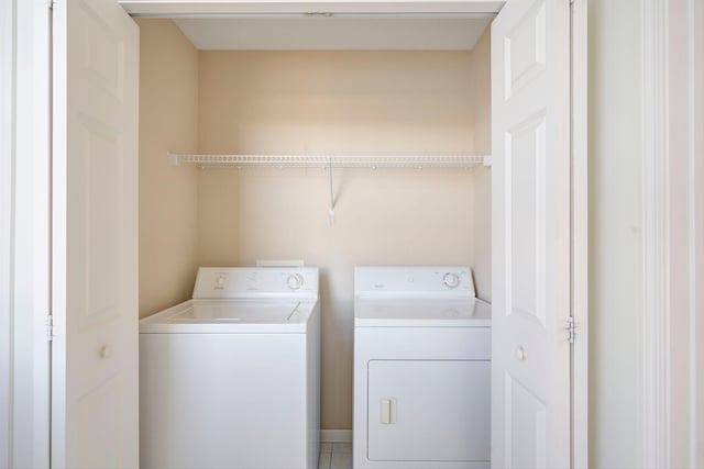 washroom with laundry area and separate washer and dryer