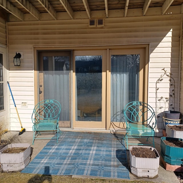 6237 Magda Dr Unit A, Maple Grove, MN 55369 - property entrance featuring a patio area