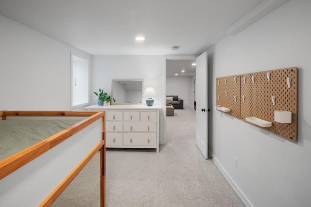 bedroom featuring recessed lighting, baseboards, and light carpet