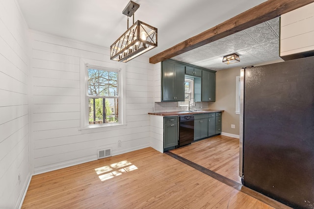 910 Nevada Ave W, Saint Paul, MN 55117 - kitchen with freestanding refrigerator, dishwasher, light wood-type flooring, beamed ceiling, and baseboards