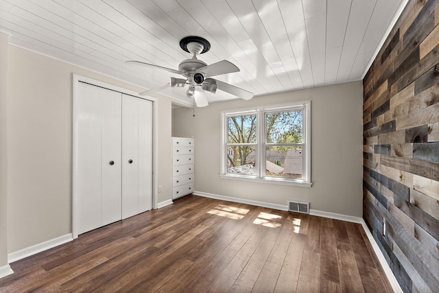 910 Nevada Ave W, Saint Paul, MN 55117 - unfurnished bedroom with wood finished floors, a closet, baseboards, and ceiling fan