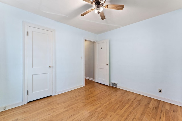 910 Nevada Ave W, Saint Paul, MN 55117 - unfurnished bedroom featuring light wood-type flooring, baseboards, and ceiling fan