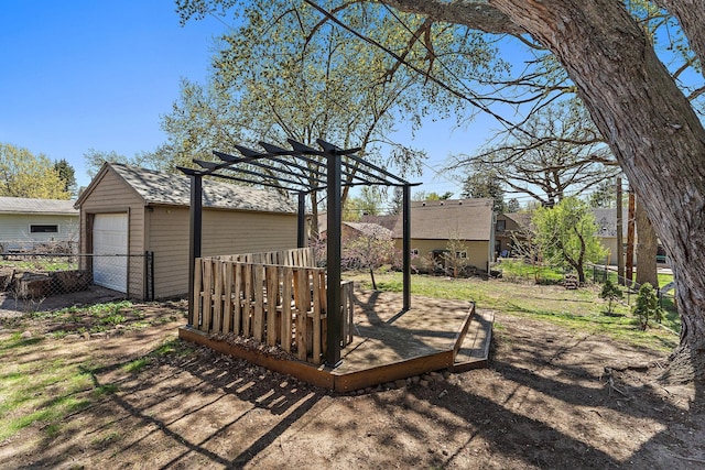 910 Nevada Ave W, Saint Paul, MN 55117 - view of yard with fence, a garage, and an outbuilding