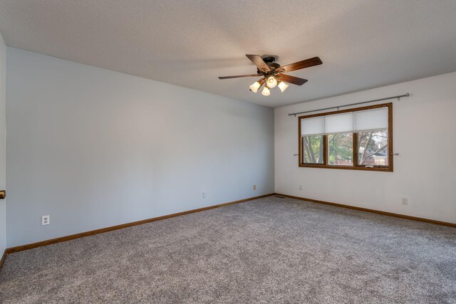19 Robin Ct, North Mankato, MN 56003 - unfurnished room with carpet flooring, a ceiling fan, baseboards, and a textured ceiling