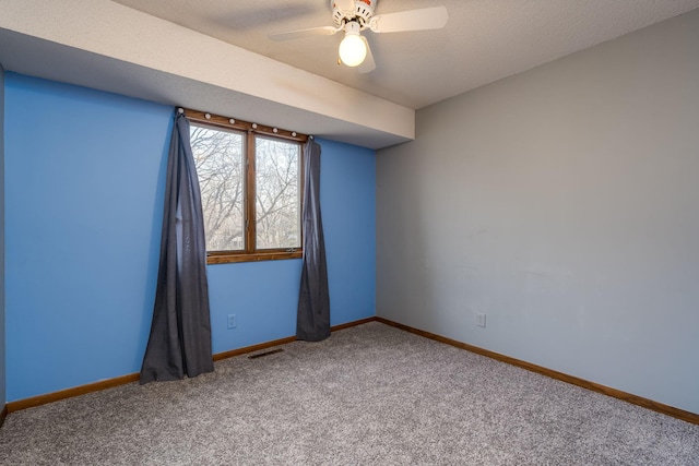 19 Robin Ct, North Mankato, MN 56003 - unfurnished room featuring carpet, a ceiling fan, and baseboards
