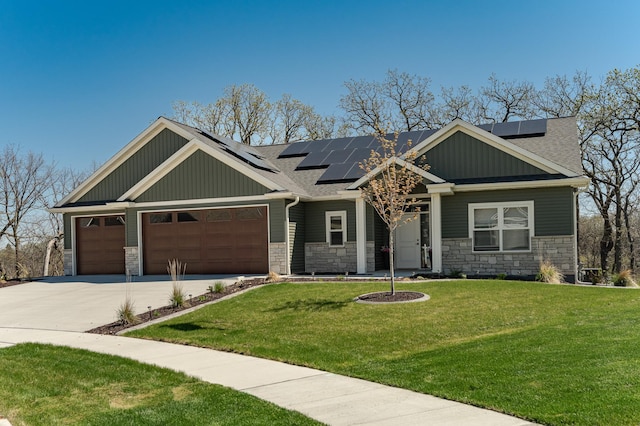 craftsman-style home with stone siding, board and batten siding, an attached garage, and a front lawn