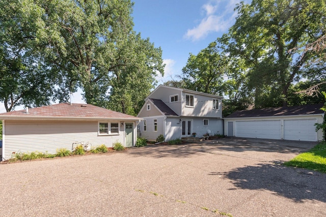 5446 Bartlett Blvd, Mound, MN 55364 - view of front of property with an outbuilding and a detached garage