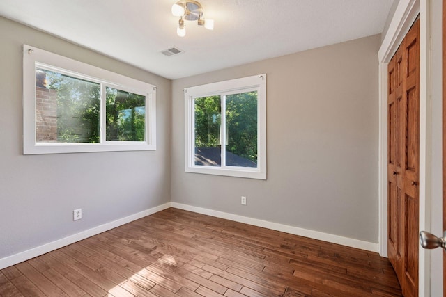 5446 Bartlett Blvd, Mound, MN 55364 - unfurnished room with wood finished floors