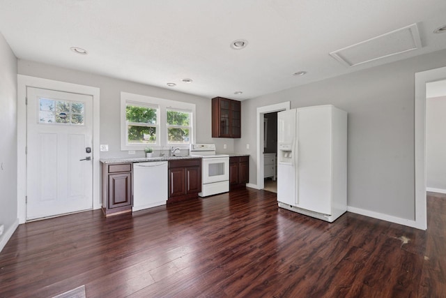 5446 Bartlett Blvd, Mound, MN 55364 - kitchen with white appliances, dark wood-style flooring, glass insert cabinets, recessed lighting, and dark brown cabinetry