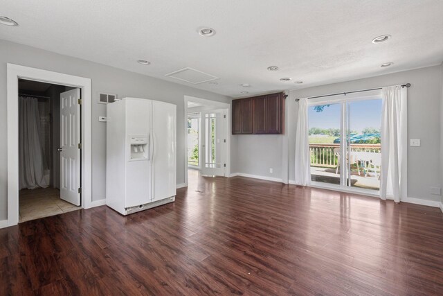 5446 Bartlett Blvd, Mound, MN 55364 - unfurnished living room with wood finished floors and recessed lighting