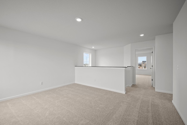 1520 Philipp Way, Shakopee, MN 55379 - spare room featuring light colored carpet, recessed lighting, and baseboards
