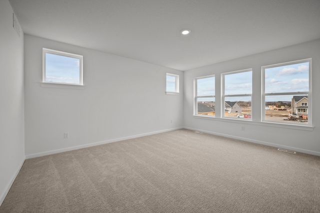1520 Philipp Way, Shakopee, MN 55379 - spare room with baseboards, light carpet, and recessed lighting