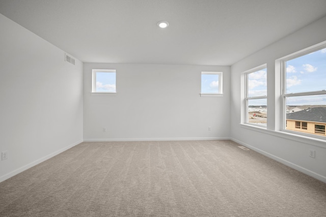 1520 Philipp Way, Shakopee, MN 55379 - spare room with plenty of natural light, baseboards, light colored carpet, and recessed lighting